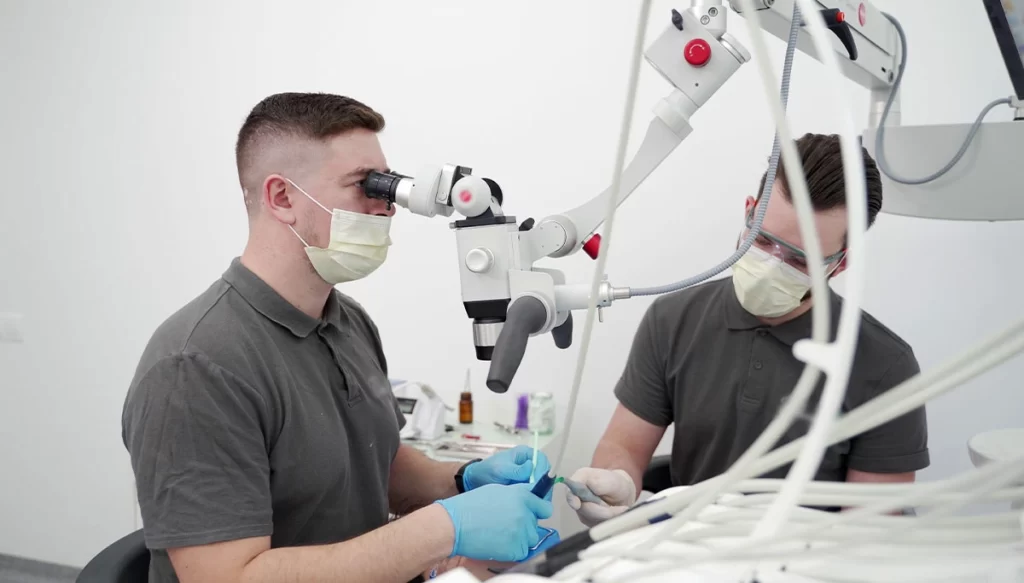 endodontist looking through device