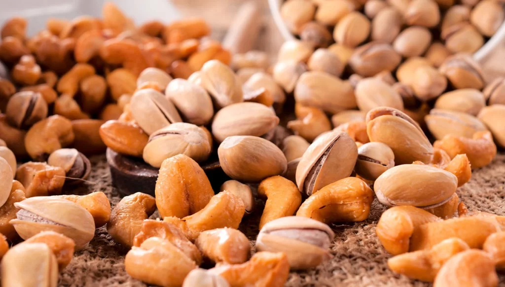 close up shot of pistachio nuts and peanuts