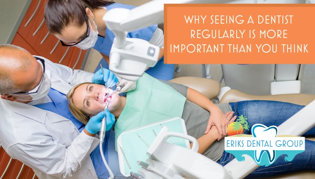 woman in dentist chair while dentist and assistant cleans her teeth