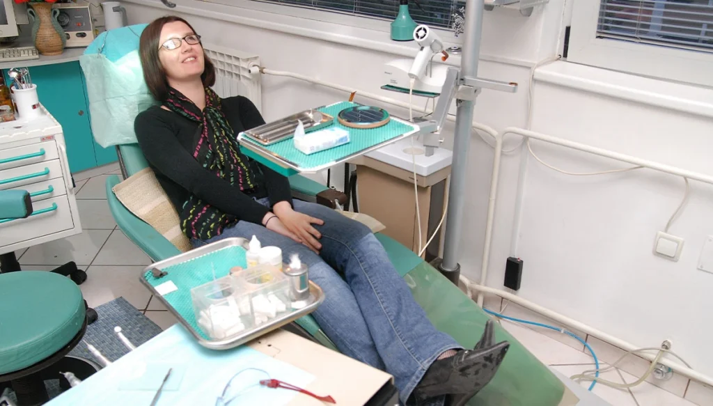 woman sitting in dentist chair