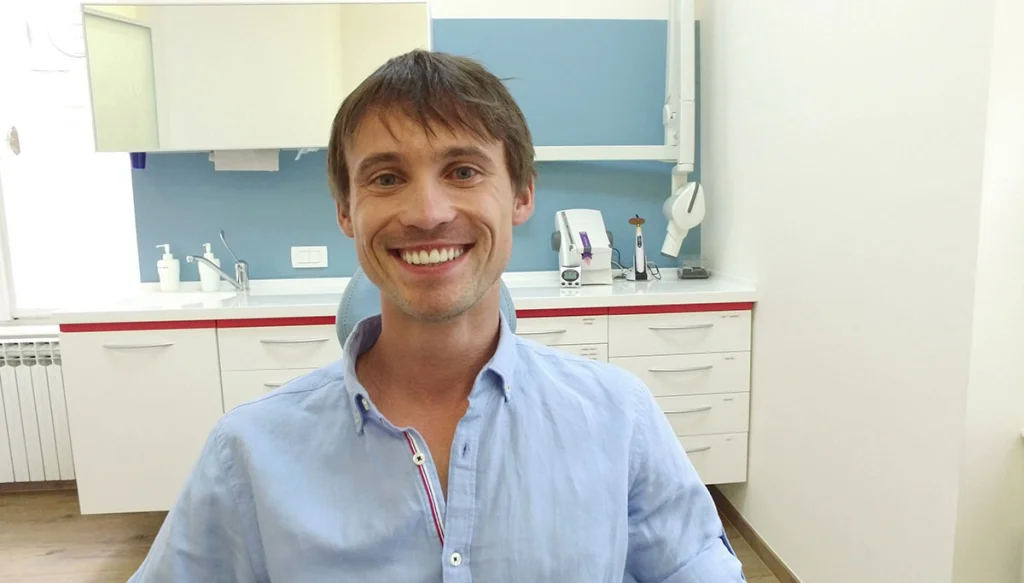 dental patient smiling in a dentist office